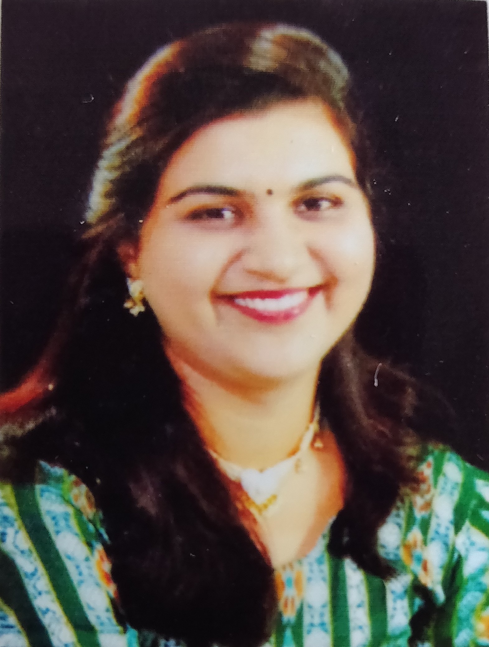 Dr. Usha Keshav Sangale